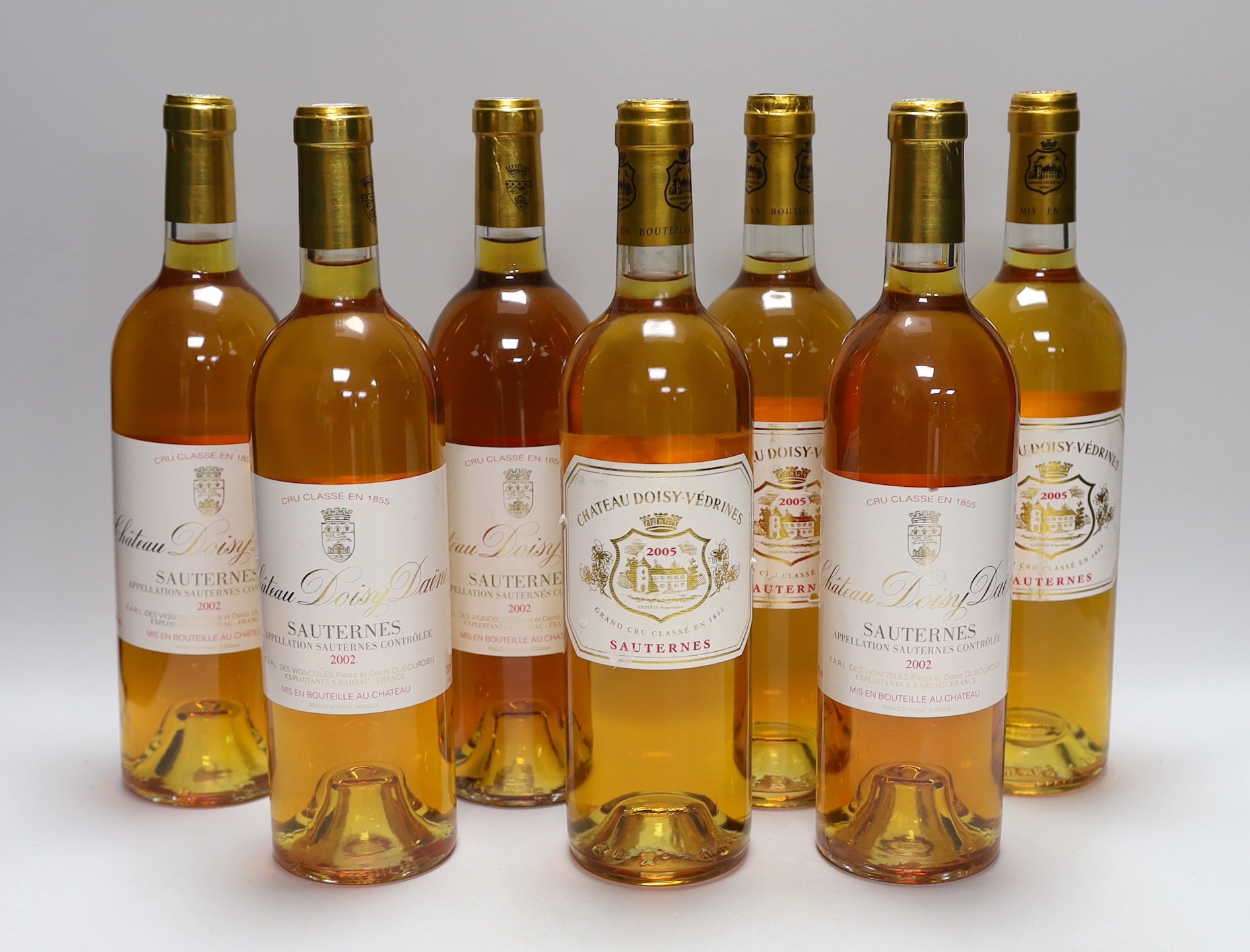Seven assorted bottles of Sauternes